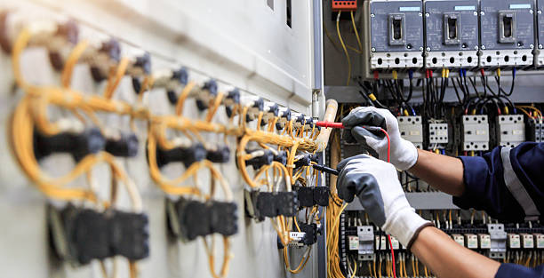 Professional Electrician technician working in Watergate, FL